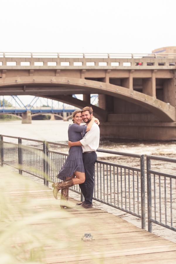Couple engagement portraits in Grand Rapids on River walk