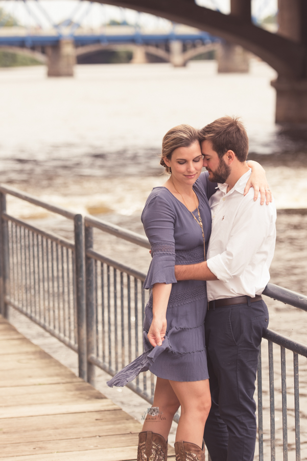 Couple engagement portraits in Grand Rapids on River walk