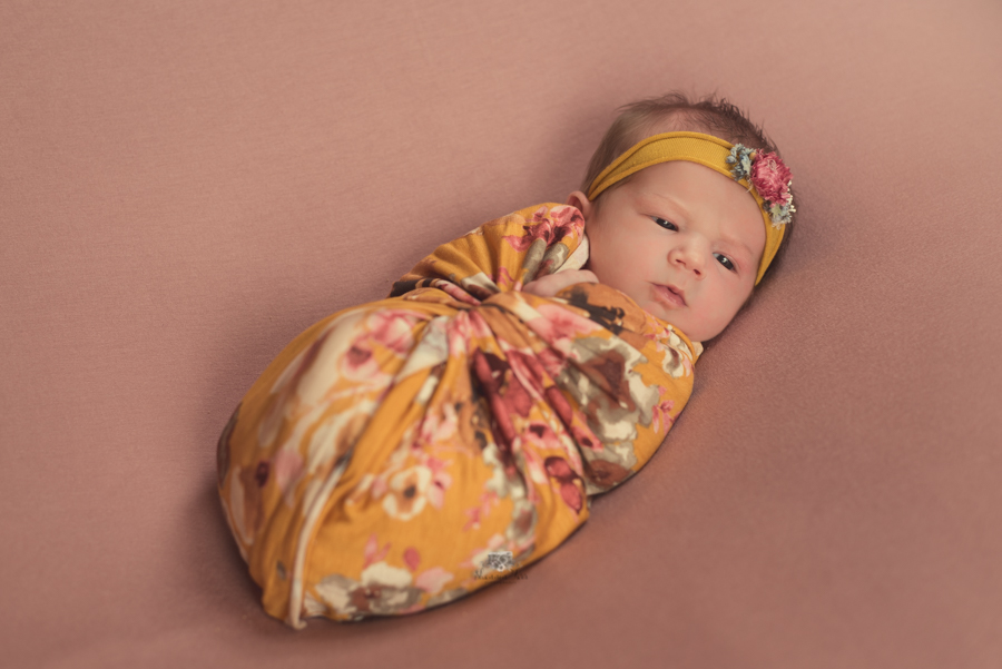 Newborn Photography in St. Louis studio with floral wrap