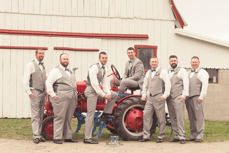 Groomsmen by tractor on J-Hill Farms