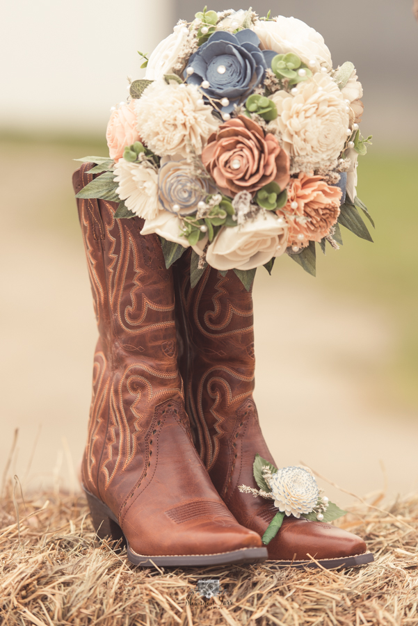 Cowboy boots farm inspired wedding details