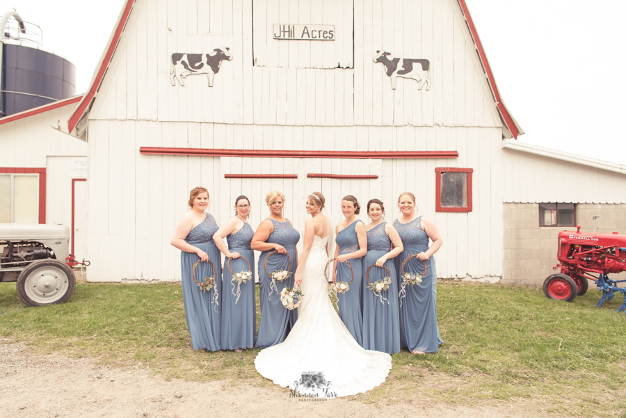 Bridesmaids in front of barn J-Hill Farms