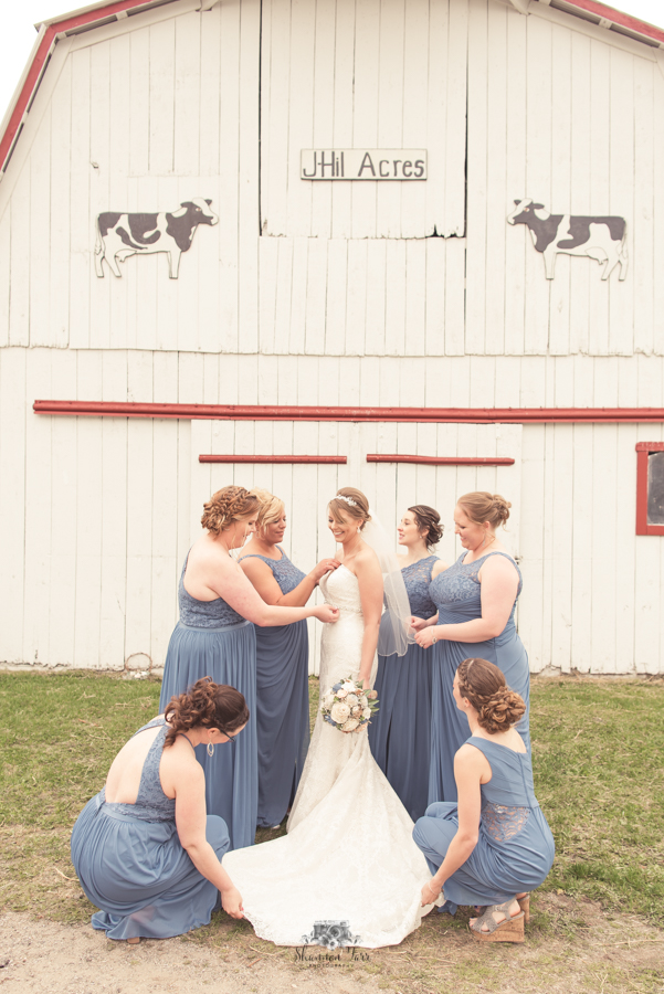 Bridesmaids prepping bride J-Hill Farms