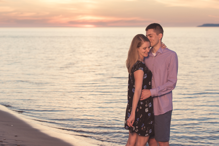 Couple engagement at Glen Haven, MI beach
