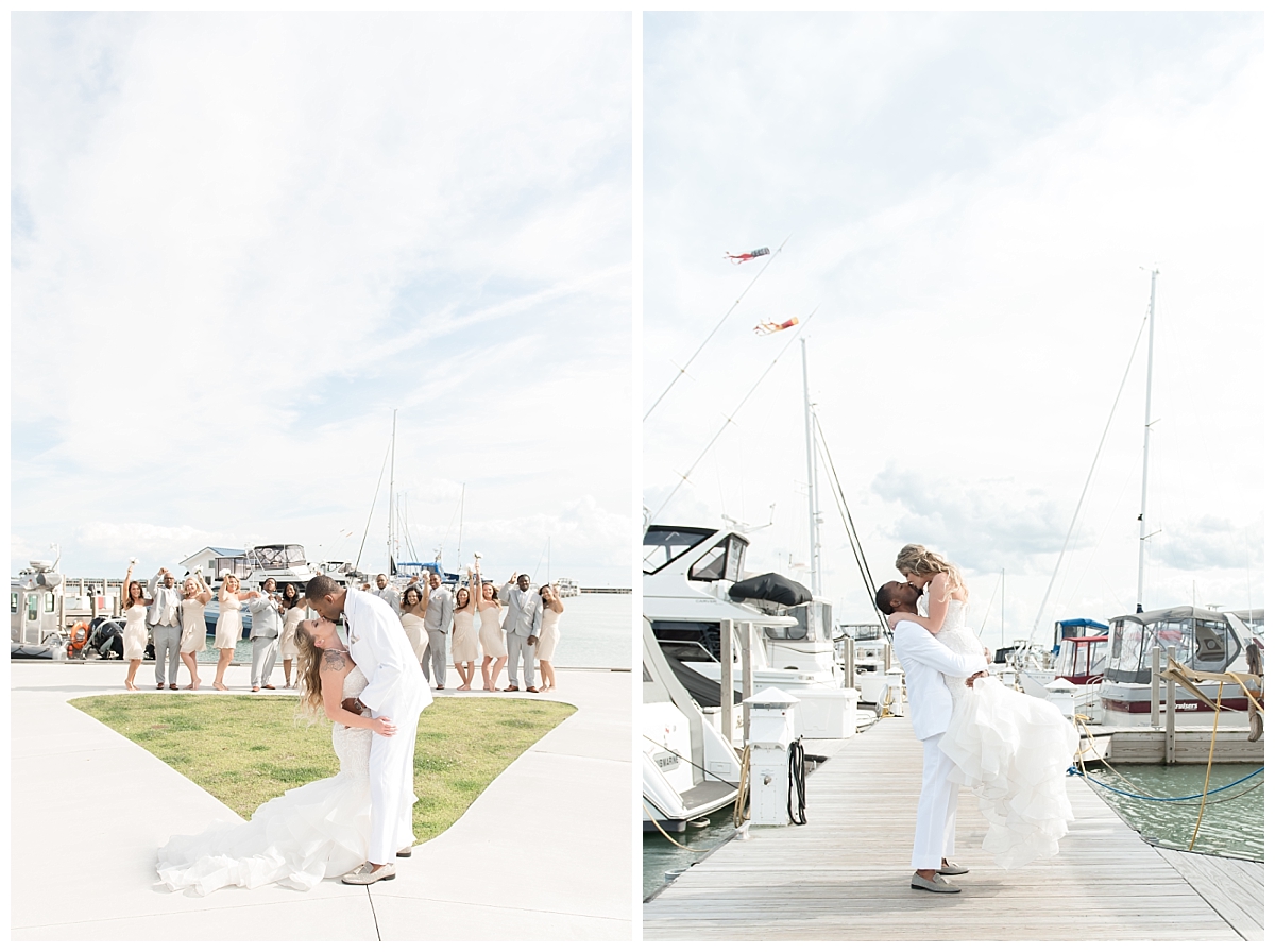 couple wedding portraits standing on pier at tawas beach bay resort