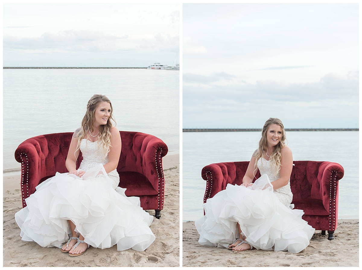 bridal portraits at beach in tawas on red couch