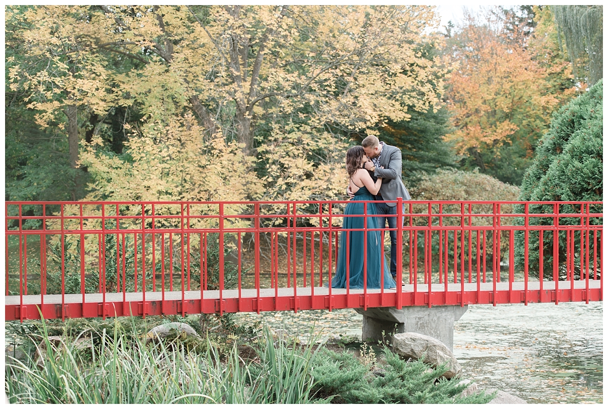couple on dow gardens red bridge
