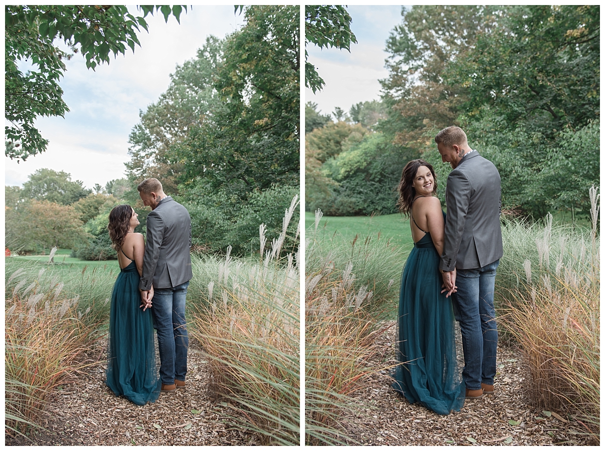 couple engagement portraits in tall grass at dow gardens