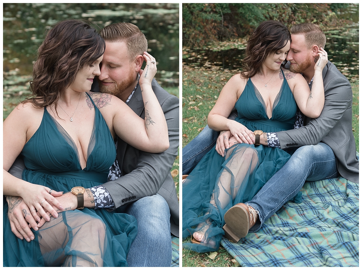 couple holding each other on blanket at dow gardens
