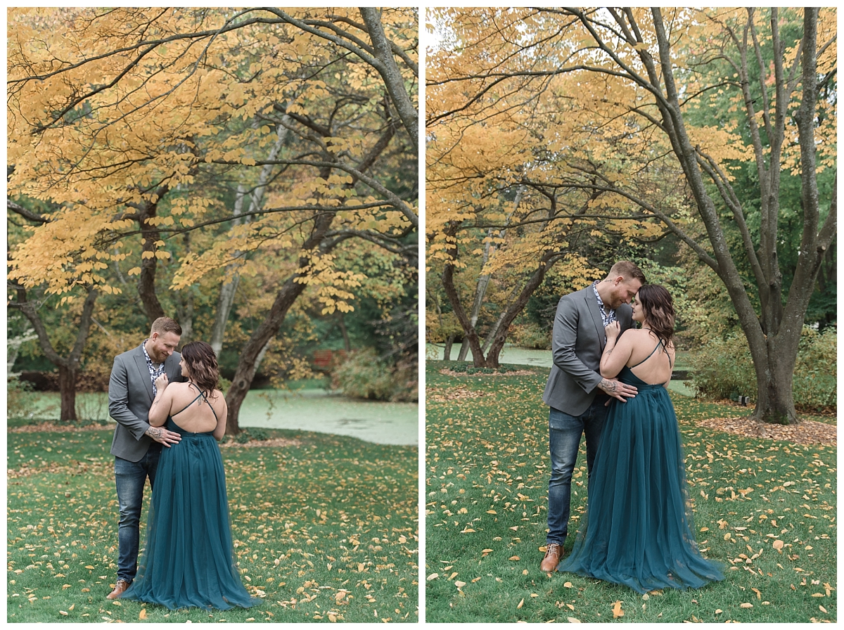 couple standing under fall tree at dow gardens