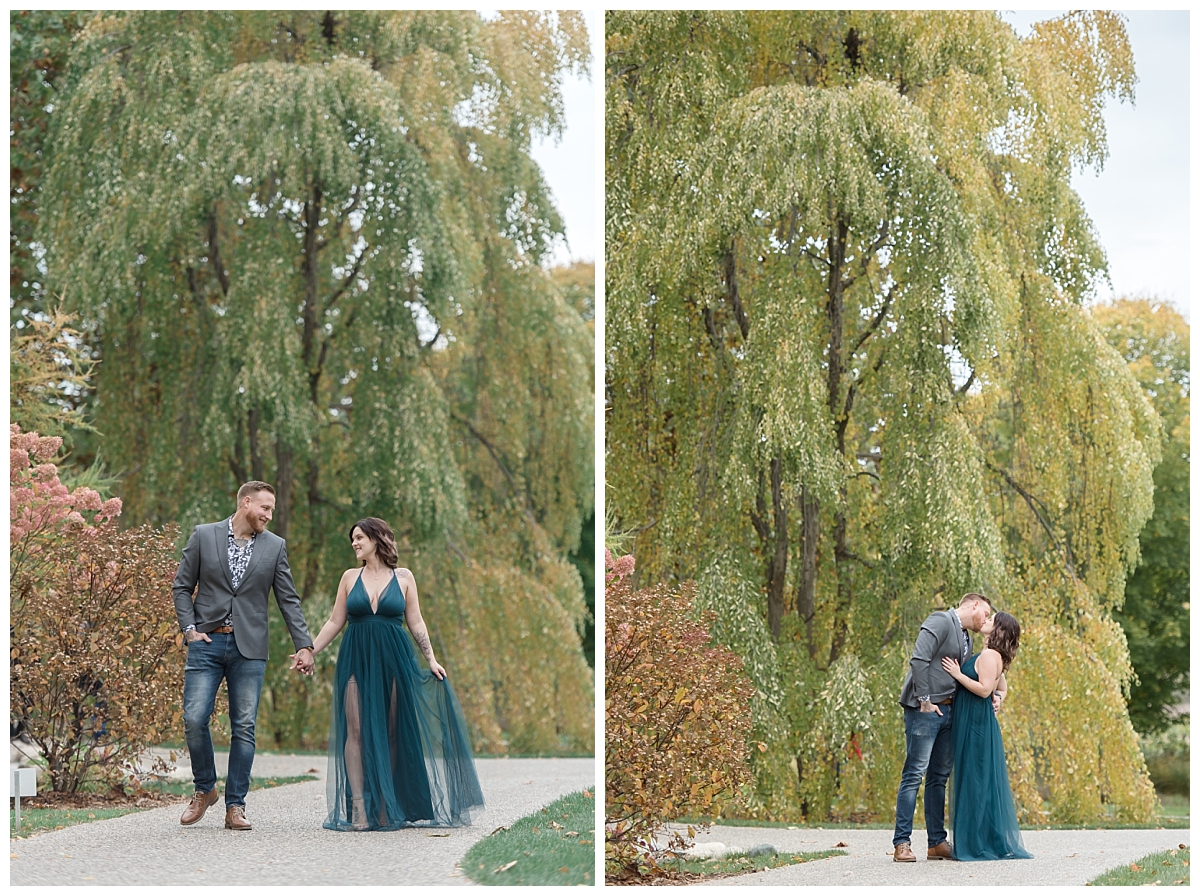 couple walking by willow tree